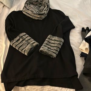 Oversized sweater with faux fur cowl neck and cuffs